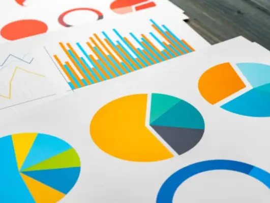 Colourful pie charts and bar graphs representing ad campaigns Norwich & Norfolk, PPC performance analytics, and data-driven digital marketing strategies.